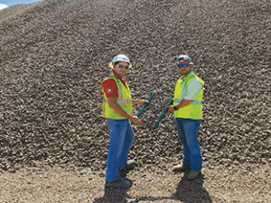 Polydeck regional manager Kent Ropp, left, worked with Alleyton Vox plant manager Brandon Genzer to fine-tune screening performance. Photo courtesy of Polydeck 