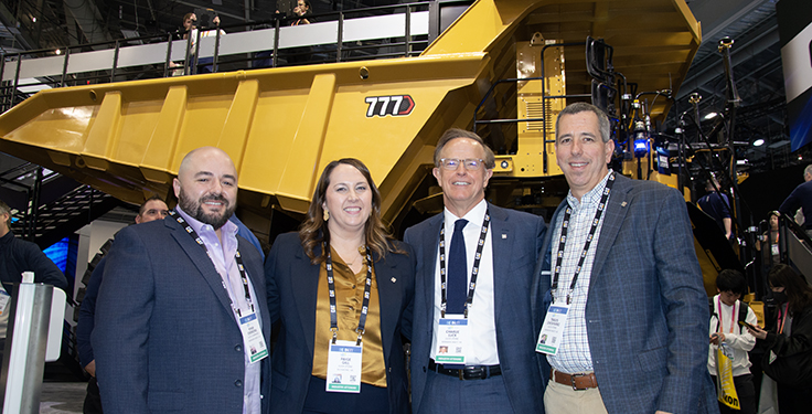 From left: Luck Stone’s Ryan Emmons, Paige Gill, Charlie Luck IV and Travis Chewning were present at CES in Las Vegas to celebrate the company’s new venture with Caterpillar. Photo: P&Q Staff
