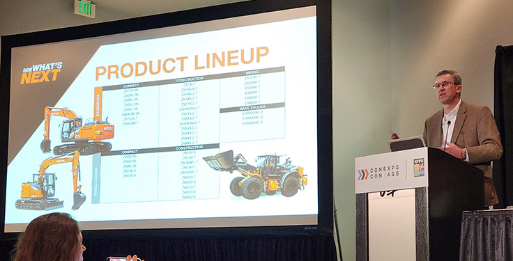 Simon Wilson, vice president of sales at Hitachi Construction Machinery Americas, delivered a rundown of new equipment offerings from the company at a press conference Monday at ConExpo-Con/Agg. Photo: P&Q Staff